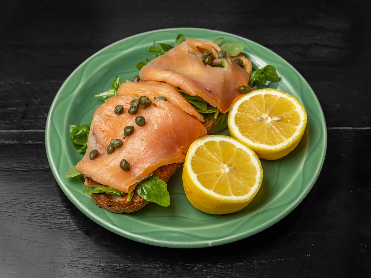 Plated salmon crispino with capers and lemon